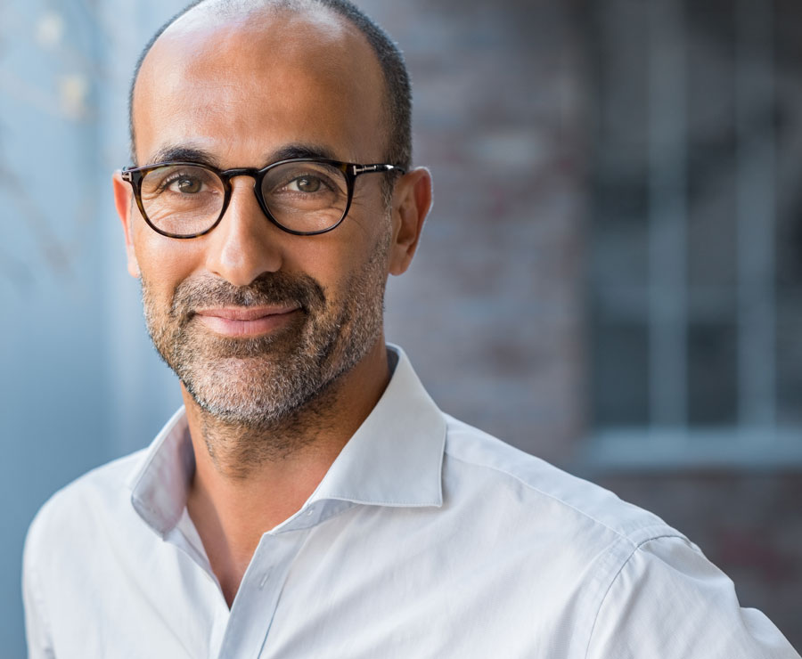 Close up face of U.S. small business man smiling